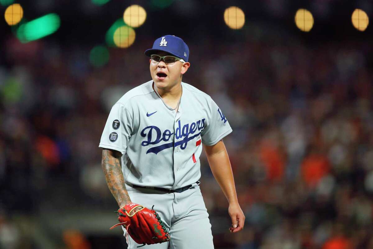 Los Angeles Dodgers pitcher Julio Urias reacts during the second inning of Game 2 of a baseball National League Division Series against the San Francisco Giants Saturday, Oct. 9, 2021, in San Francisco.