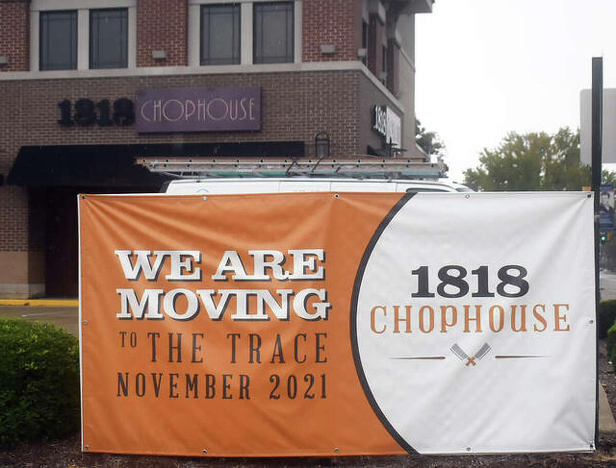 A sign sits in front of 1818 Chophouse announcing the restaurant’s move next month to Trace on the Parkway.