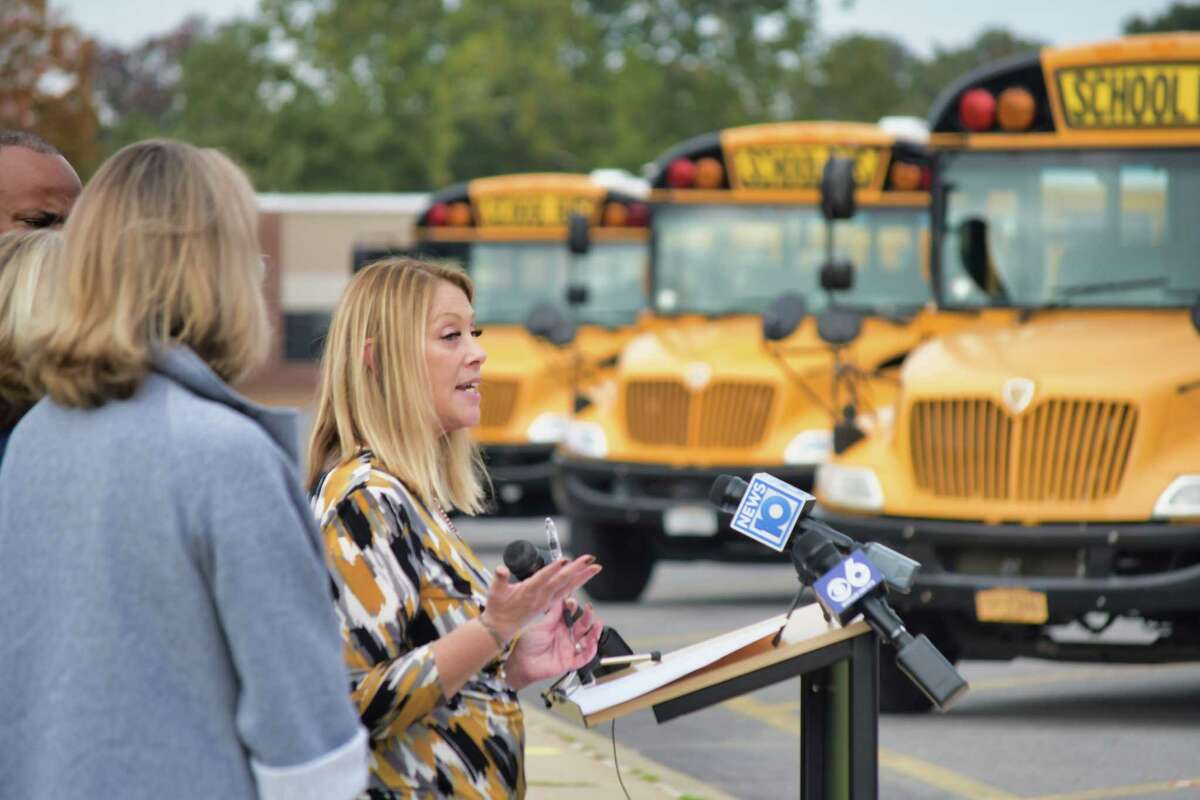 Belinda Govich, president of the Capital Area Chapter of the New York Association for Pupil Transportation, speaks at a press conference held to call attention to the serious school bus driver shortage in the region on Thursday, Oct. 14, 2021, in Clifton Park, N.Y.