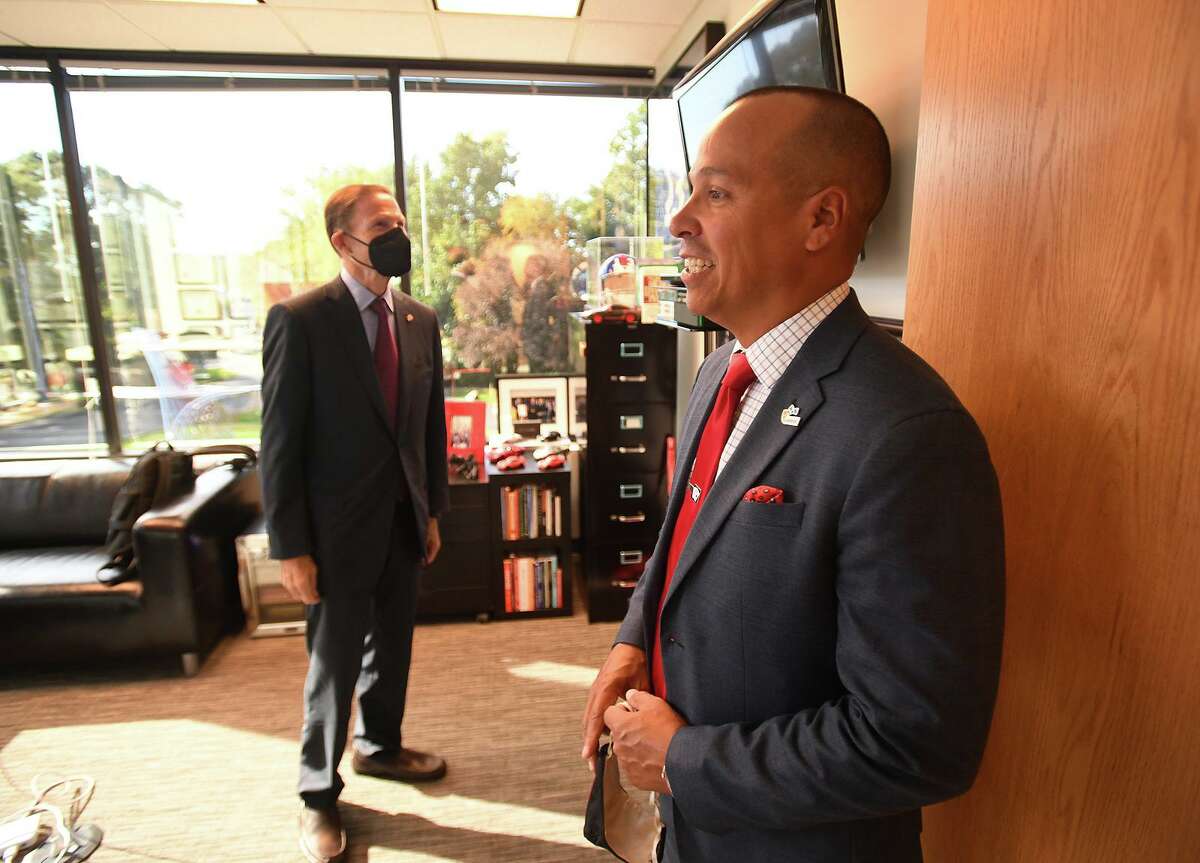 Ramon Peralta, right, gives a tour of Peralta Design to Senator Richard Blumenthal during his visit to the business in Shelton, Conn. on Tuesday, October 12, 2021. Blumenthal was visiting to coincide with the creation of a Connecticut minority business development center.