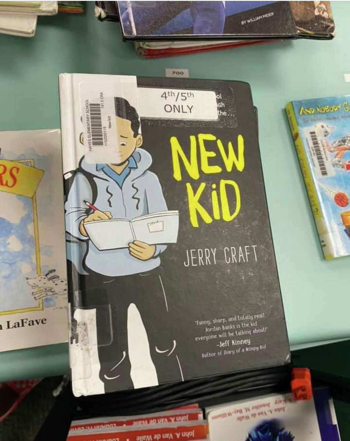 Jerry Craft's graphic novels are back on Katy ISD library shelves after a review committee found the claims against them baseless.