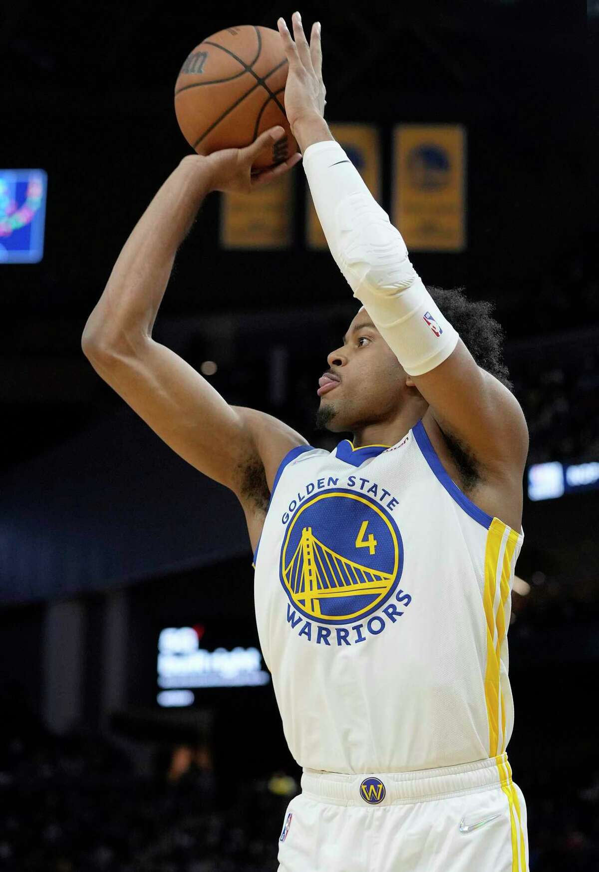 SAN FRANCISCO, CALIFORNIA - OCTOBER 08: Moses Moody #4 of the Golden State Warriors shoots a three-point shot against the Los Angeles Lakers at Chase Center on October 08, 2021 in San Francisco, California. NOTE TO USER: User expressly acknowledges and agrees that, by downloading and/or using this photograph, User is consenting to the terms and conditions of the Getty Images License Agreement. (Photo by Thearon W. Henderson/Getty Images)