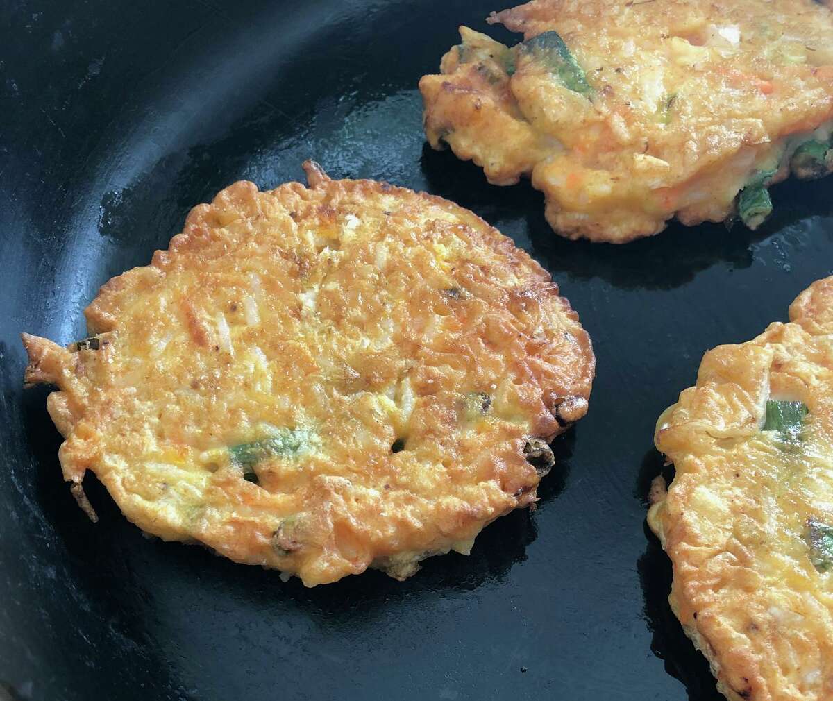 Got leftover rice? Fold it into these crispy fritters, inspired by