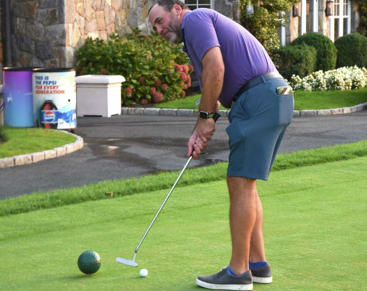 Tim Oberweger hosted the recent CLC Golf Outing in Glenville, which benefited the Children’s Learning Centers of Fairfield County, and he also took part in the putting contest. The event raised more than $100,000 for the nonprofit.