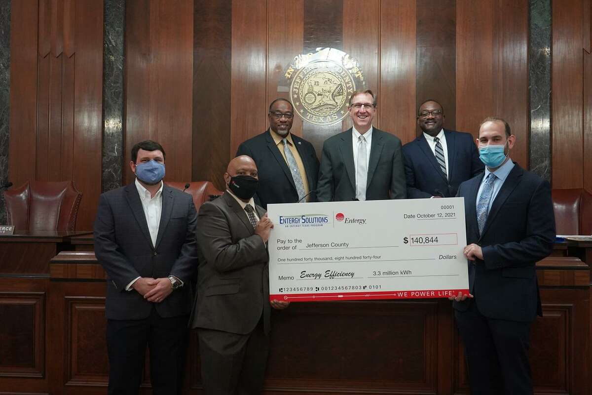 The Entergy Corporation presented the Jefferson County Commissioner's Court with a check for $140,844.49 as a rebate for upgrading to energy-efficient infrastructure.