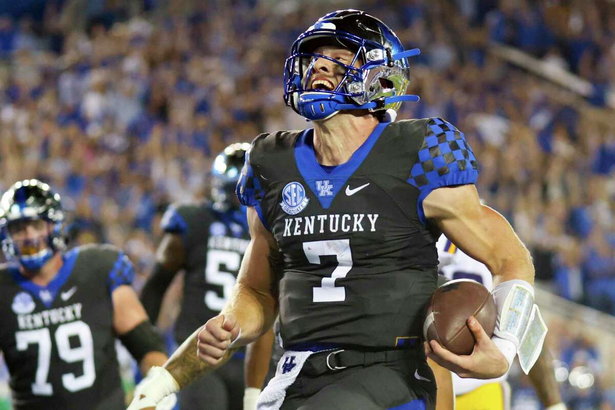 Kentucky quarterback Will Levis (7) carries the ball into the end zone for a touchdown during an NCAA college football game against LSU in Lexington, Ky., Saturday, Oct. 9, 2021. (AP Photo/Michael Clubb)