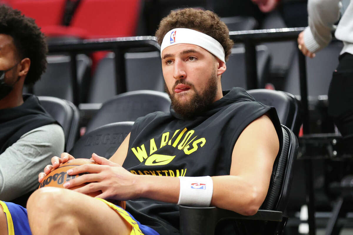 Klay Thompson of the Golden State Warriors looks on before the preseason game against the Portland Trail Blazers at Moda Center on October 04, 2021 in Portland, Oregon.