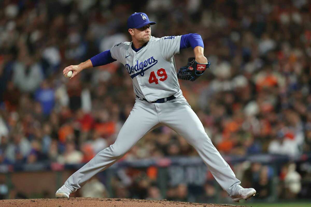 Los Angeles Dodgers' Blake Treinen pitches against the San Francisco Giants during the seventh inning of Game 5 of a baseball National League Division Series Thursday, Oct. 14, 2021, in San Francisco.