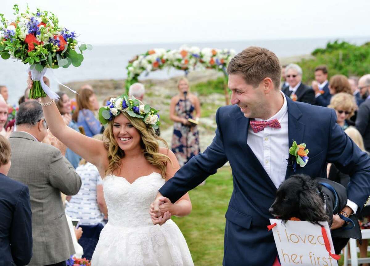 Shea and Jeff Cohen in 2018 after their wedding vows in Ogunquit, Maine. The Monroe, Conn. couple have launched a website called E-Bration which provides a central depository for digital cards and mementos pegged to life events, as well as the ability to send commemorative cards, invites and cash gifts.