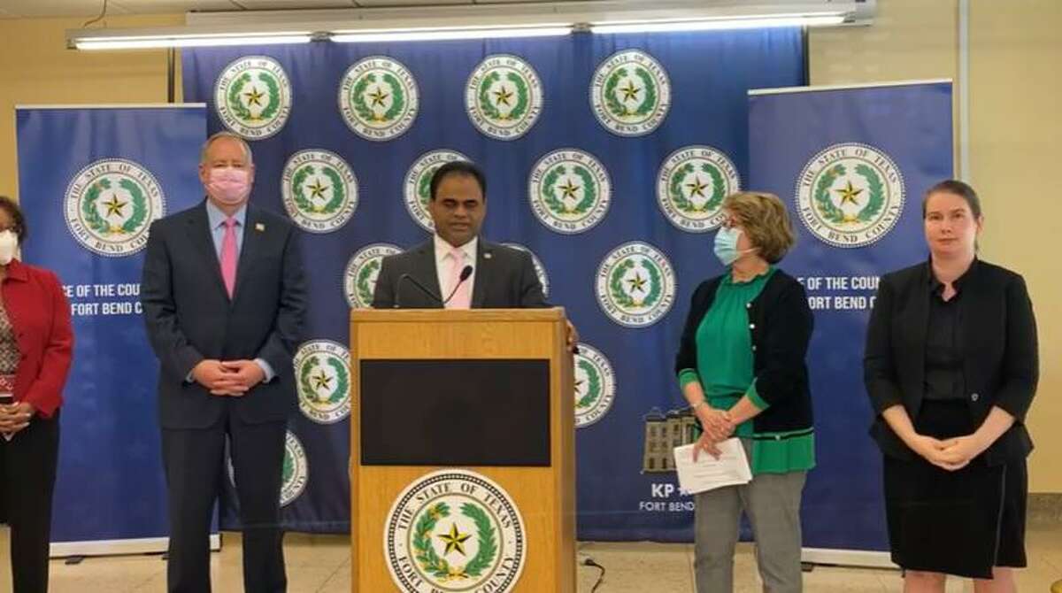 Fort Bend County Judge KP George joins community leaders to address reporters at a press conference on lowering the COVID-19 risk level on Wednesday, Oct. 13.