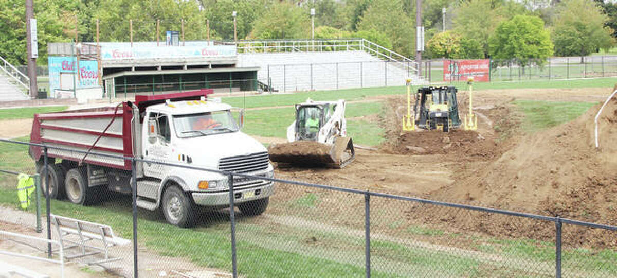Workers from Byrne and Jones Construction removed the infield at Lloyd Hopkins Field at Gordon Moore Park on Wednesday in preparation for a new artificial turf. Completion of the infield is expected in December.