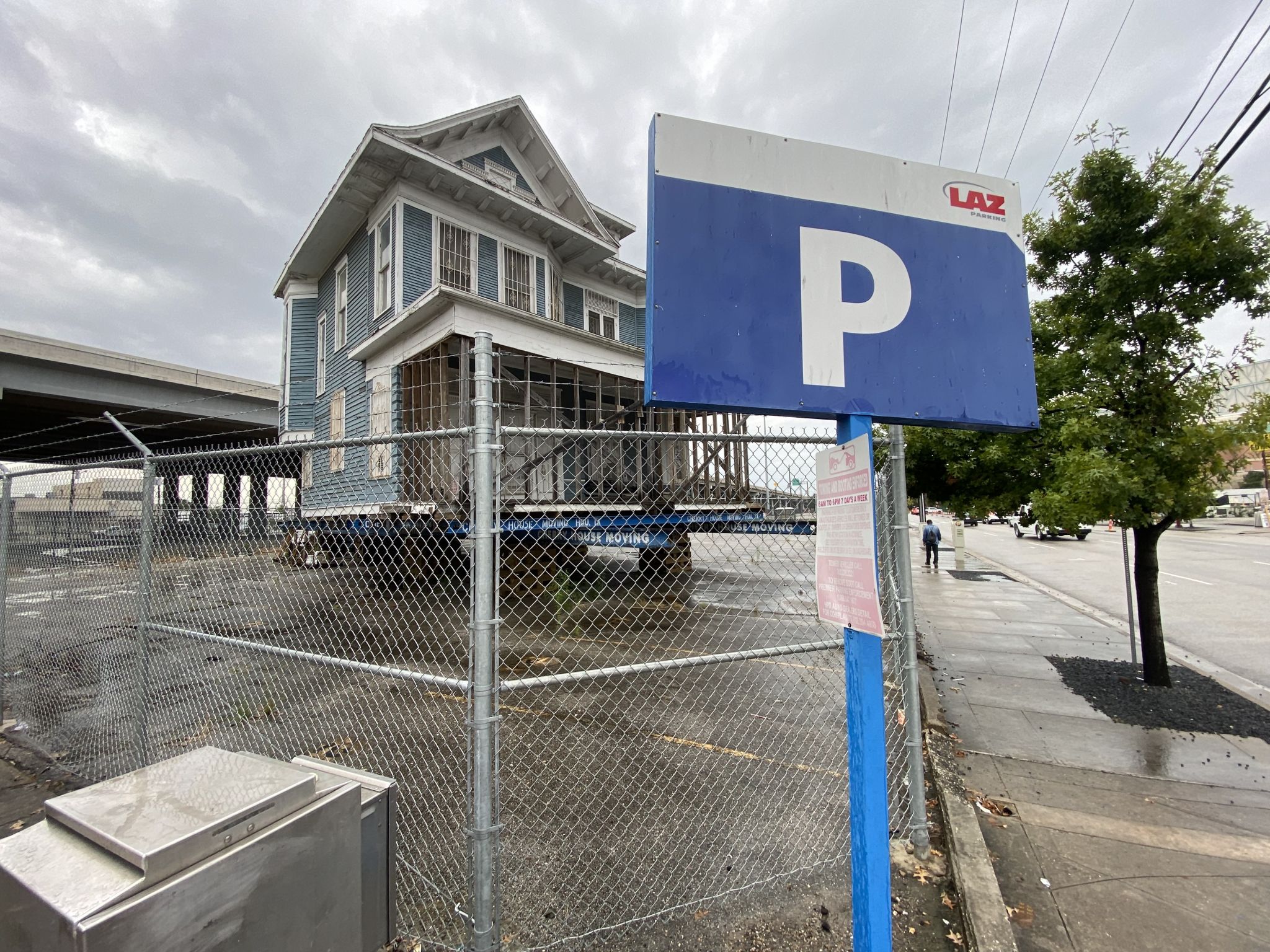 Why is the big blue Cohn house sitting in a Houston parking lot?