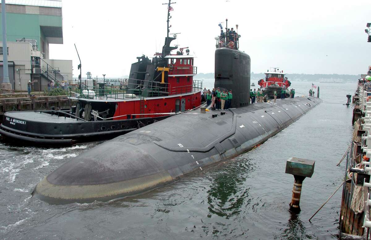 In this 2004 file photo, the U.S.S. Virginia returns to the Electric Boat Shipyard in Groton after its first sea trials.