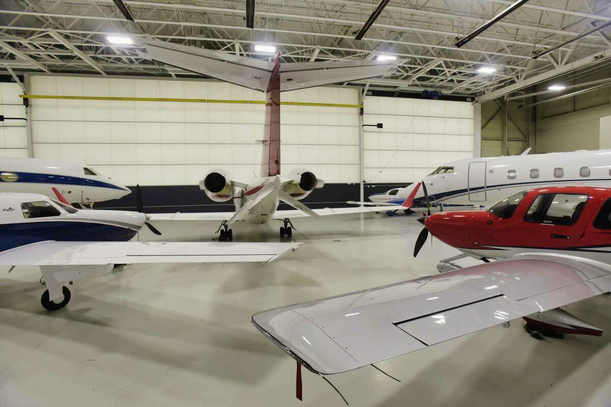 A view of some of the planes in one of the hangars at Million Air on Wednesday, Oct. 13, 2021, at the Albany International Airport in Colonie, N.Y.