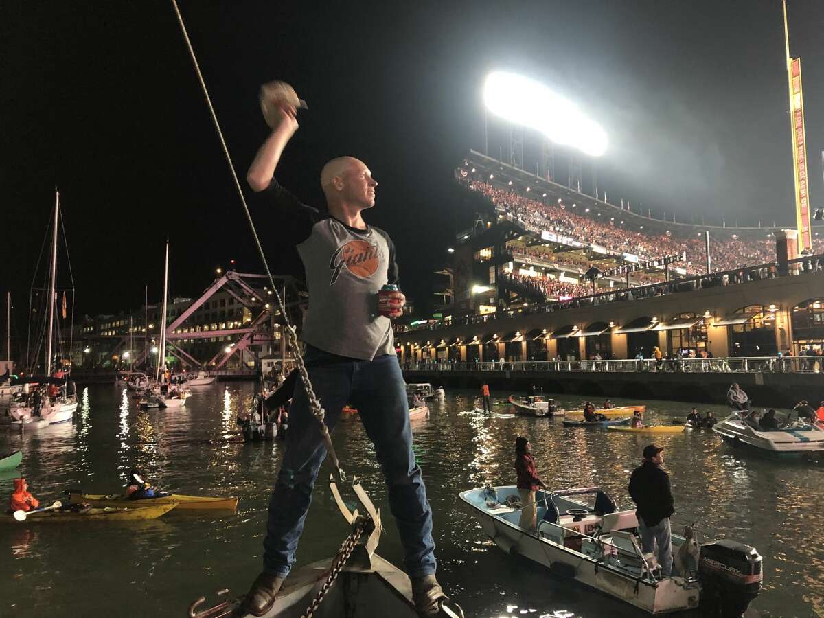 Eli Brooks celebrates a run during the Dodgers-Giants game Thursday, Oct. 15, 2021, in McCovey Cove.