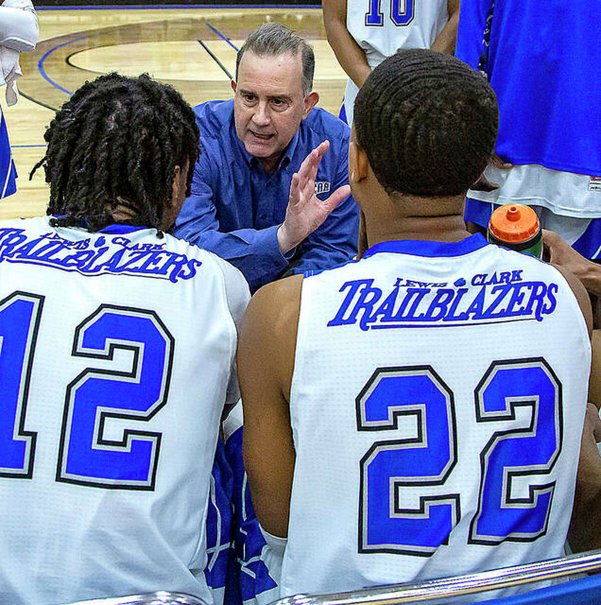 Lewis and Clark Community College men’s basketball coach Doug Stotler talks to his team during a timeout during the 2020 season.