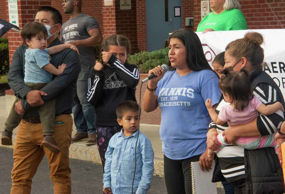 Surrounded by her grieving family, Marisol of Carmel speaks during a rally of immigration advocates protesting the living conditions and medical neglect they say ICE detainees held at Rensselaer County Jail face on Friday, Oct, 15, 2021 in Troy, N.Y. Marisol’s sister is detained in the jail. The protestors gathered in Taras Shevchenko Park and marched to Rensselaer County Jail.