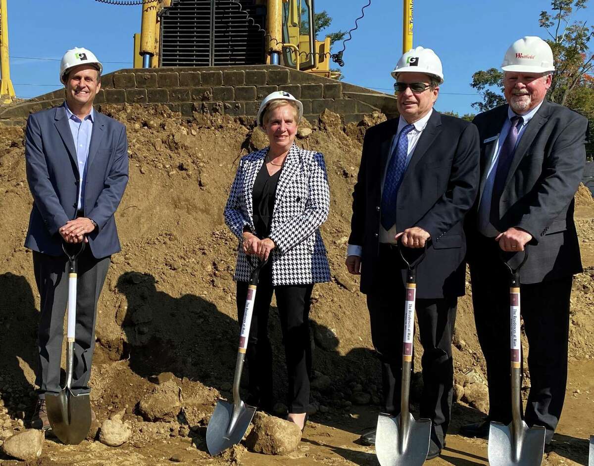 Scott Loventhal of Garden Communities, First Selectwoman Vicki Tesoro, Eli Pechthold of Garden Communities, and Westfield representative Patrick Madden at the groundbreaking ceremony for the Residences at Main on Oct. 15, 2021.