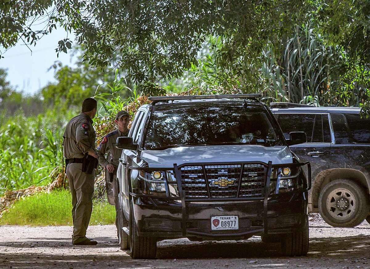 Department of Public Safety troopers keep watch on the border at Del Rio, Texas, on Wednesday, July 30, 2021. Texas Gov. Greg Abbott has sent the Texas National Guard and troopers to stop the migration.