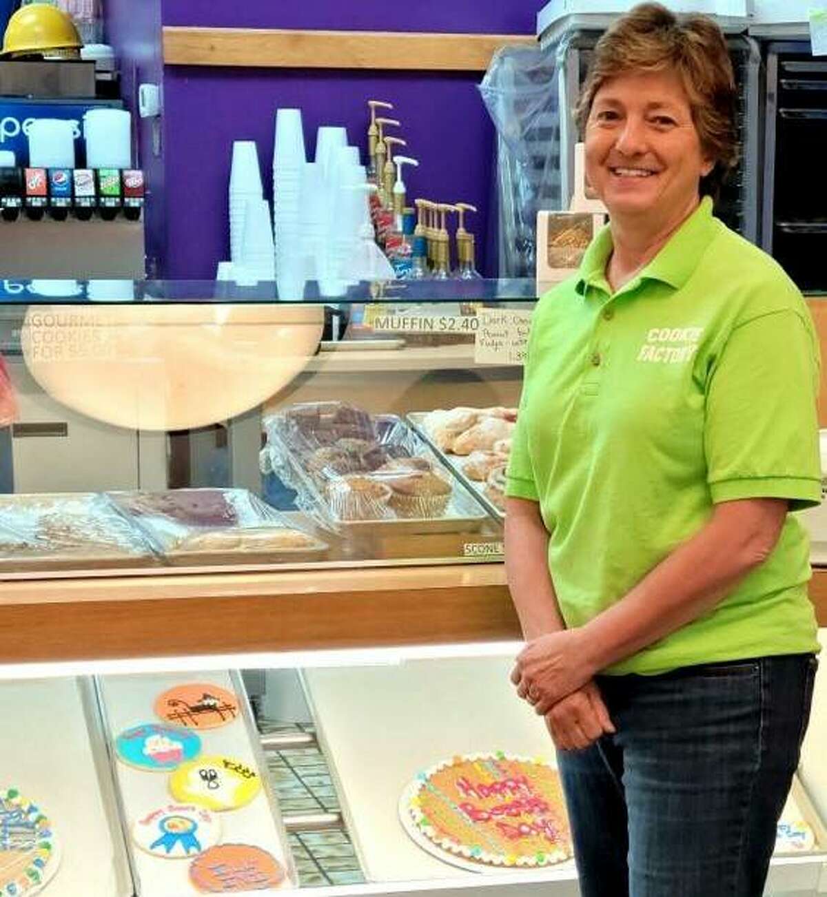 Linda McCormick, of Godfrey, owner of The Cookie Factory and Cookie Express, stands in front of her first cookie shop at 202 Alton Square which she bought in November 1978. She is retiring Jan. 1 and the business is for sale, including her second shop, Cookie Express, opened four years ago at 121 Alton Square.