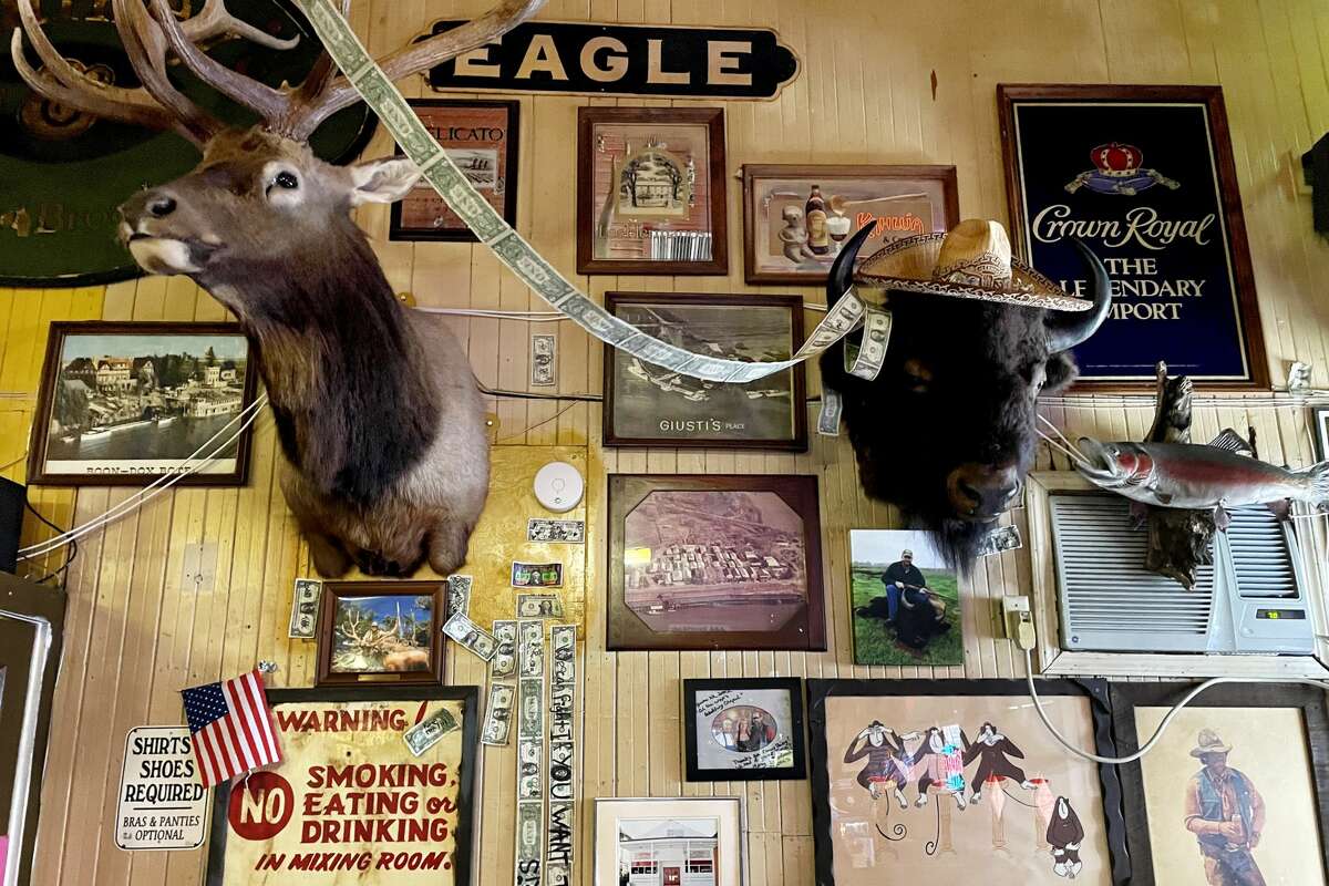 Taxidermy and tchotchkes crowd the walls at Al the Wops in Locke, Calif. 