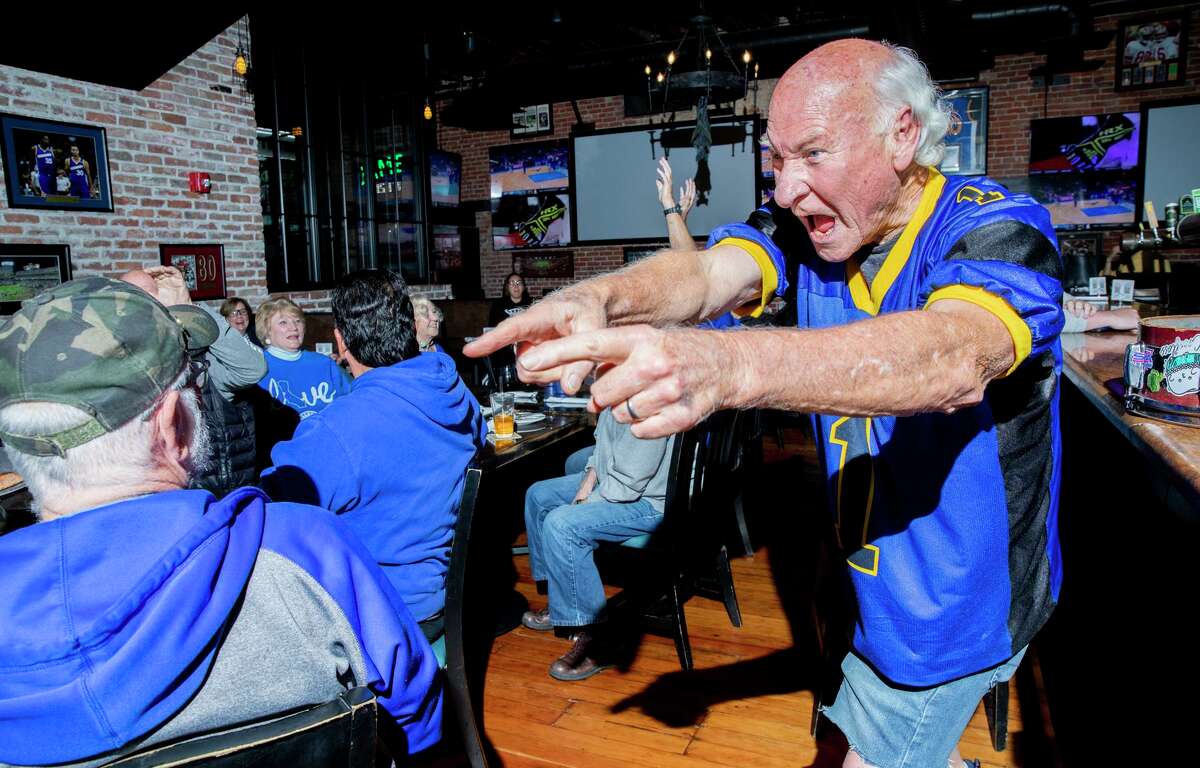 George Henderson, who is also known as Krazy George, orchestrates the wave by the Spartan Boosters at Rookies Sports Lodge, Wednesday, Oct. 13, 2021, in San Jose, Calif.