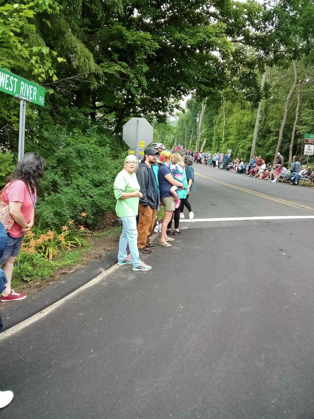 Barkhamsted residents watch the July 5, 2021 parade from the corner of West River Road in the Pleasant Valley section of town. Filmmakers are using a portion of the road for a movie, Oct. 19-20, 2021.