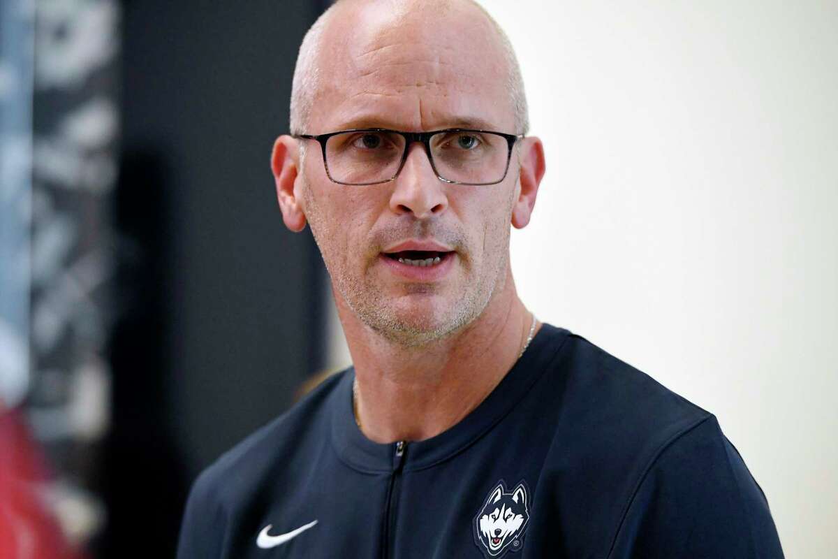 Connecticut men's basketball coach Dan Hurley meets with reporters prior to UConn's First Night event for the men's and women's teams, Friday, Oct. 15, 2021, in Storrs, Conn.(AP Photo/Jessica Hill)