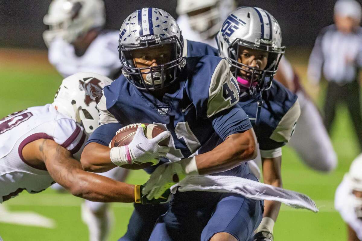 West Orange-Starke sophomore Elijah Gales (41) fights for additional yards in the first half of their quarterfinal match with Silsbee on Friday night at BISD Memorial Stadium. Fran Ruchalski/The Enterprise