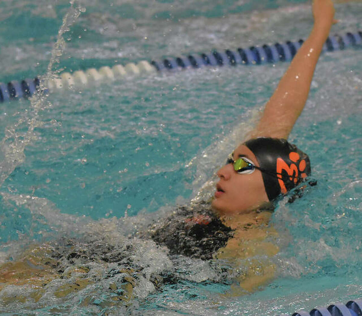 Edwardsville’s Taylor Wilkerson competes in the 100-yard butterfly on Saturday inside the Chuck Fruit Aquatic Center.