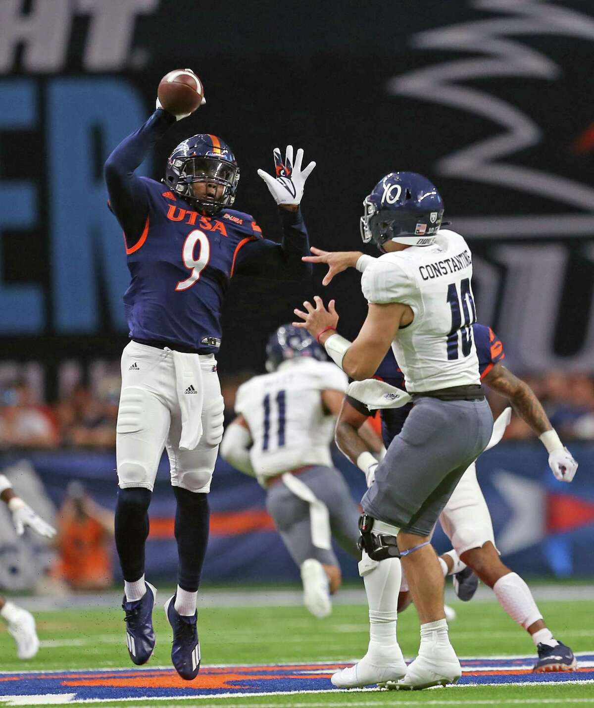 UTSA linebacker Clarence Hicks defects a pass into the arms Trevor Harmanson (not in frame) who ran it in for a touchdown on Saturday, Oct. 16, 2021 at the Alamodome.