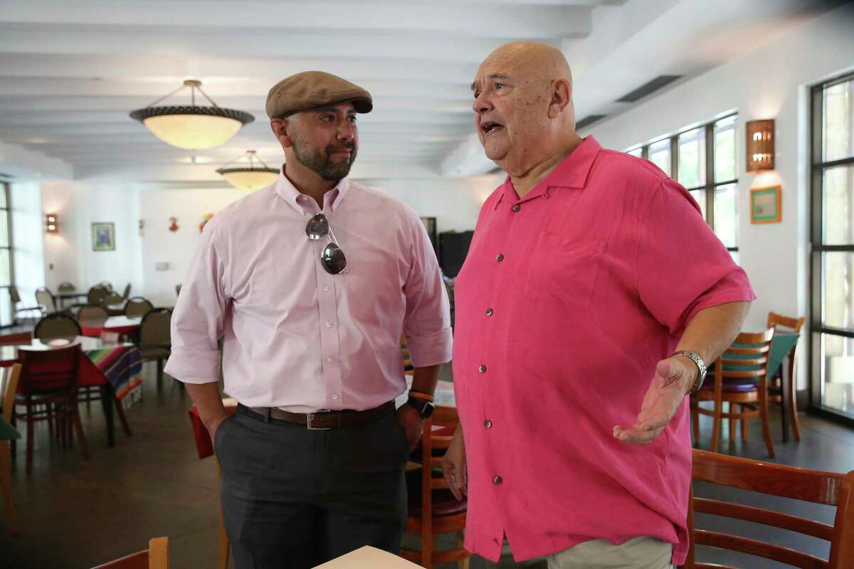 Eric Valadez, 43, left, meets with Tony Cantu, 75, at Poblanos Mexican Restaurant at Main Plaza on Tuesday, Oct. 5. Ten years ago, Valadez and his brother, Hector, 40, owners of Poblanos, lost their restaurant in the historic Wolfson Building fire. With their savings gone, scattered among the rubble, the brothers were downcast. Small deli owner Cantu, became the angel in their time of need, helping them rebuild their dream in space at San Fernando Cathedral on Main Plaza.