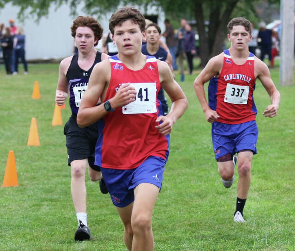 Carlinville’s Will Meyer (front) runs during a race last season at Loveless Park in Carlinville. On Saturday in Piasa, Meyer finished second to lead the Cavaliers to a conference championship in the SCC Meet.