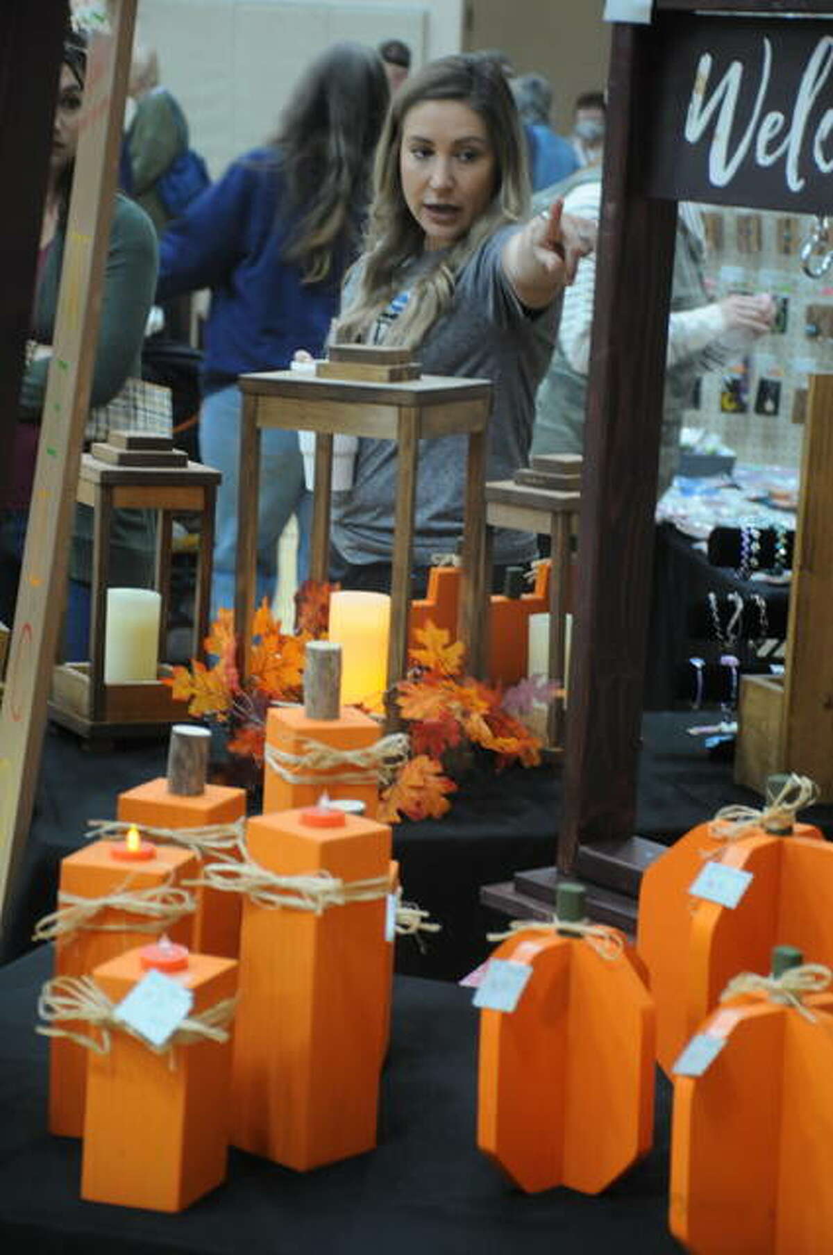Emily Clay points to an item during Saturday’s Jerseyville Craft Fair.