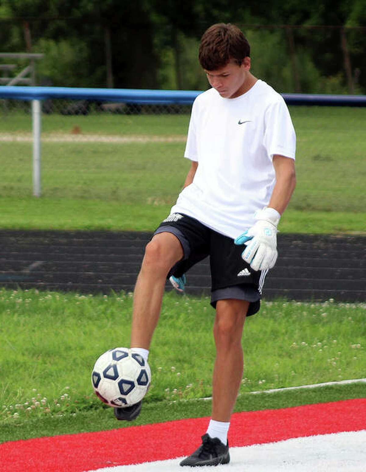Carlinville’s Will Meyer, shown here during a soccer practice session, was one of four Cavies who ran in the South Central Conference meet Saturday at Southwestern, then made it to Raymond in time for the championship game of the Lincolnwood Class 1A Soccer Regional Tourney later that morning. Meyer finished second in the SCC Cross Country Meet at Southwestern. Then he and teammates Matt Dunn, Tyler Summers and Jack Rives and helped their soccer team to a 3-1 regional championship win over host Lincolnwood.