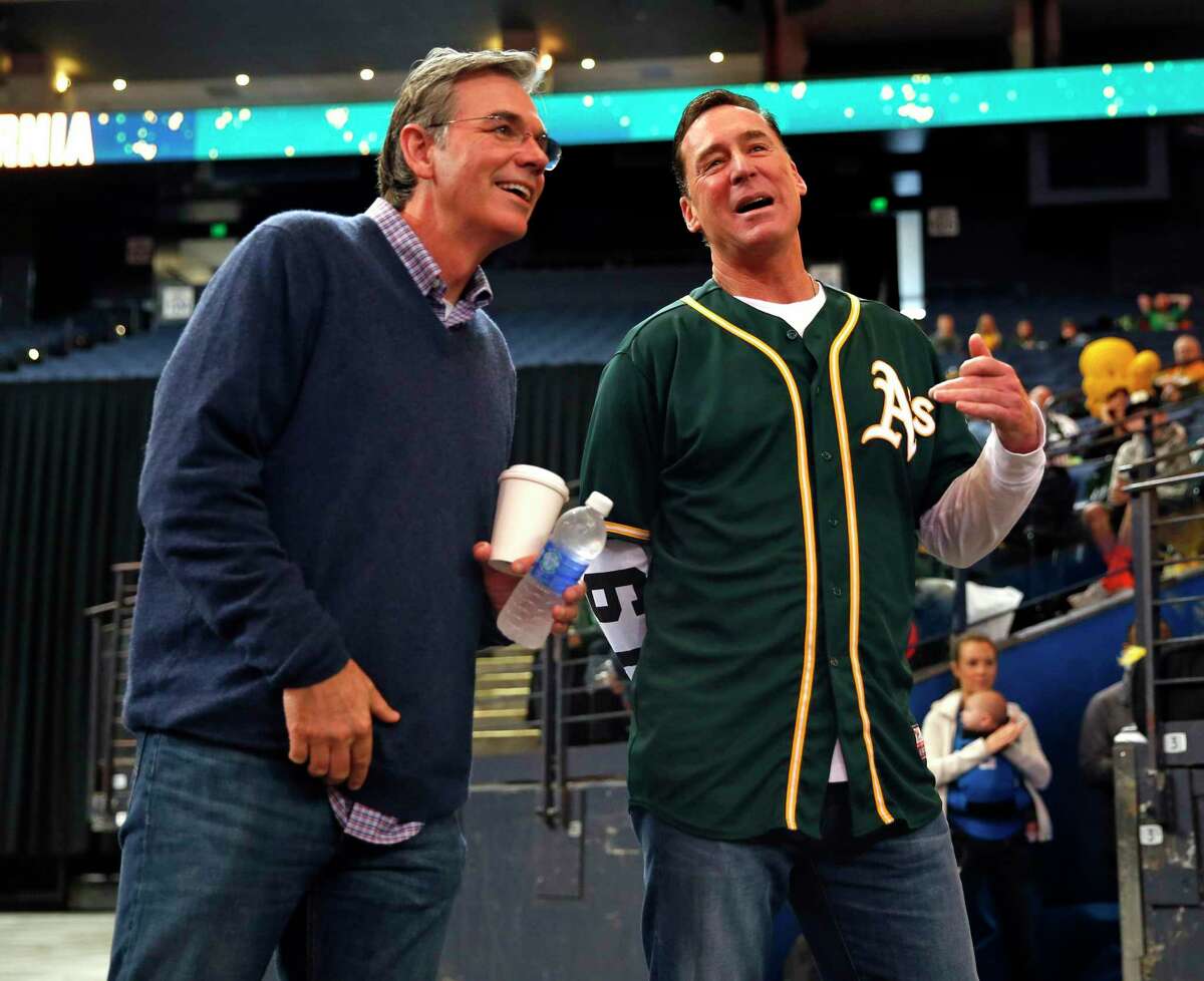 Oakland Athletics' General Manager Billy Beane (left) and Manager Bob Melvin during Fan Fest at Oracle Arena in Oakland, Calif. on Sunday, February 8, 2015.