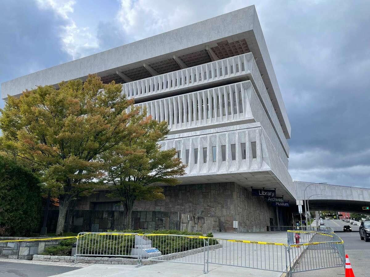 A panel on what appears to be the roof overhang fell off the New York State Museum Sunday, Oct. 18, 2021. The debris hit a terrace level of the building. No one was hurt.