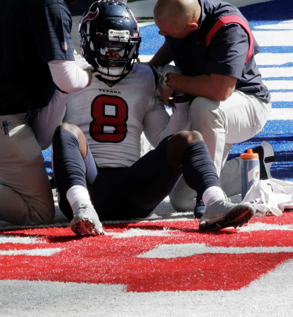 Houston Texans defensive back Terrence Brooks (8) is assisted up after getting hit during a Indianapolis Colts touchdown in the first quarter at Lucas Oil Stadium in Indianapolis on Sunday, Oct. 17, 2021. Indianapolis Colts won the game 31-3.