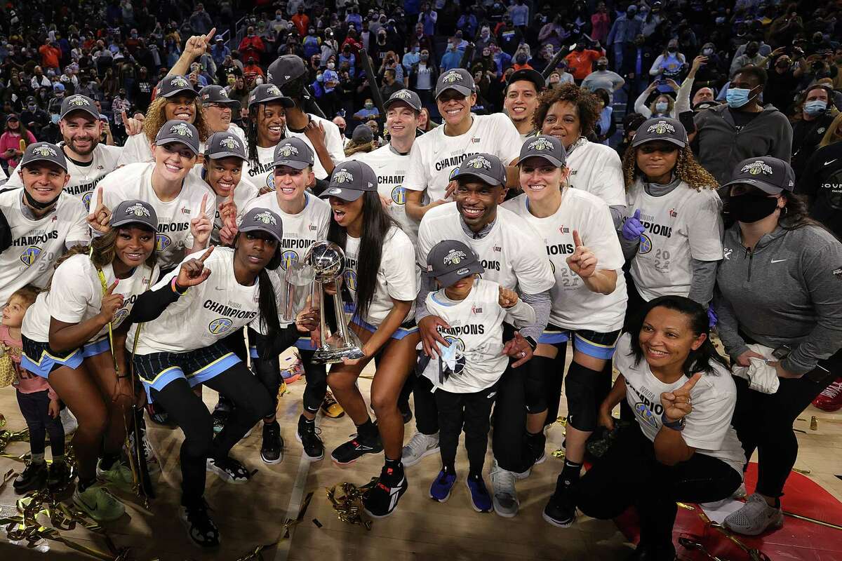 CHICAGO, ILLINOIS - OCTOBER 17: Members of the Chicago Sky pose with the trophy after defeating the Phoenix Mercury in Game Four of the WNBA Finals to win the championship at Wintrust Arena on October 17, 2021 in Chicago, Illinois. NOTE TO USER: User expressly acknowledges and agrees that, by downloading and or using this photograph, User is consenting to the terms and conditions of the Getty Images License Agreement.
