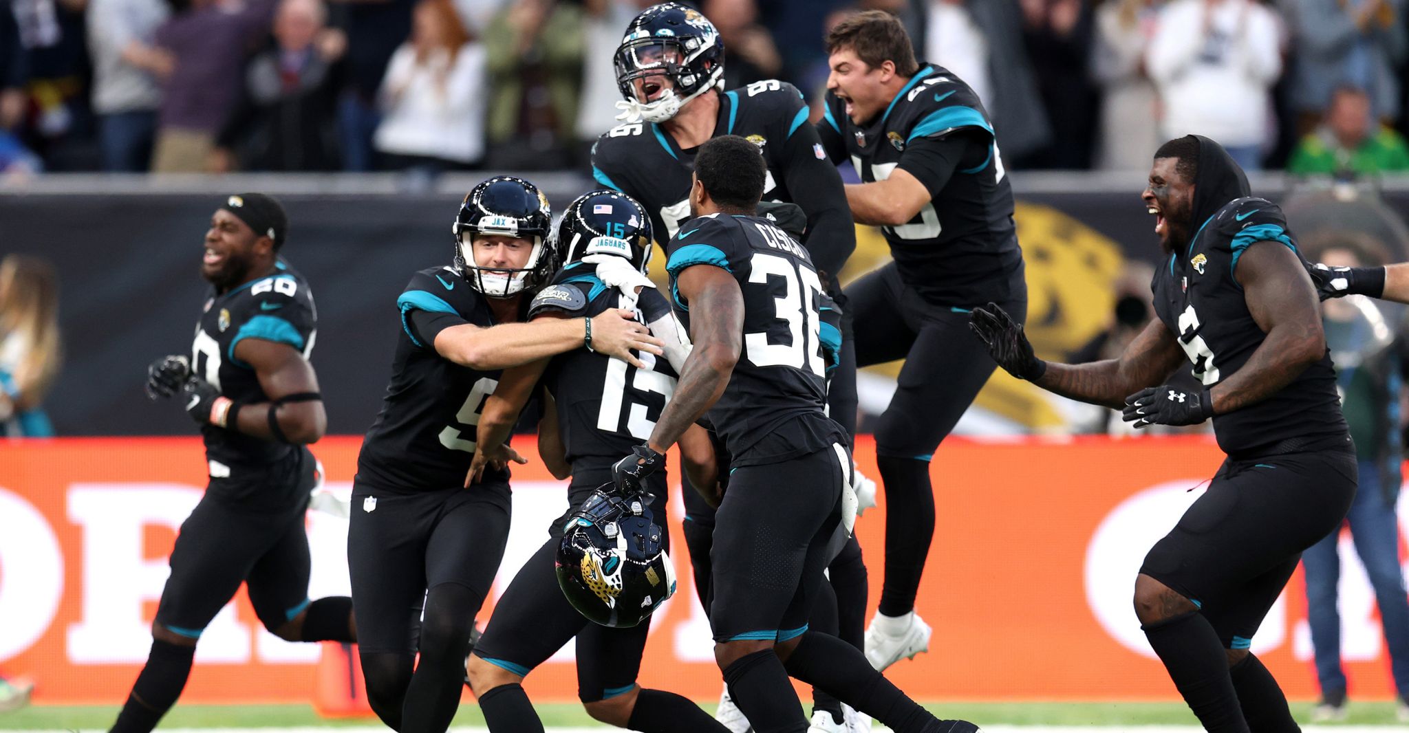 Members of the Jacksonville Jaguars defense celebrate an