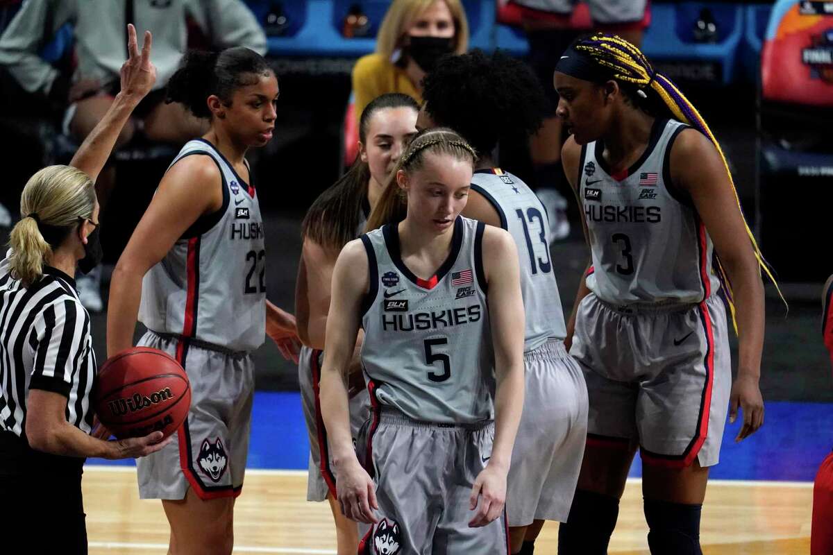Connecticut guard Paige Bueckers (5) reacts after getting fouled during the second half of a women's Final Four NCAA college basketball tournament semifinal game against Arizona Friday, April 2, 2021, at the Alamodome in San Antonio. (AP Photo/Eric Gay)