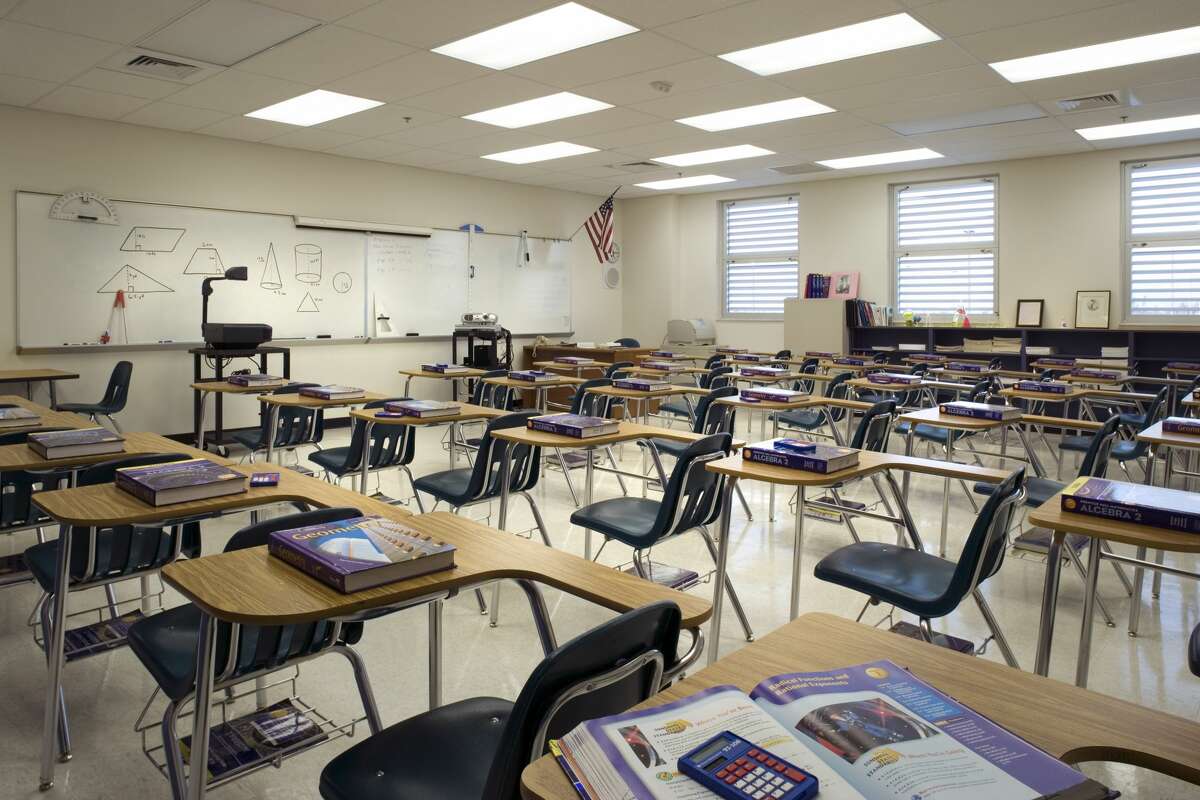 FILE - A classroom in Coral Glades High School in Tamarac, Fla. is shown empty. 