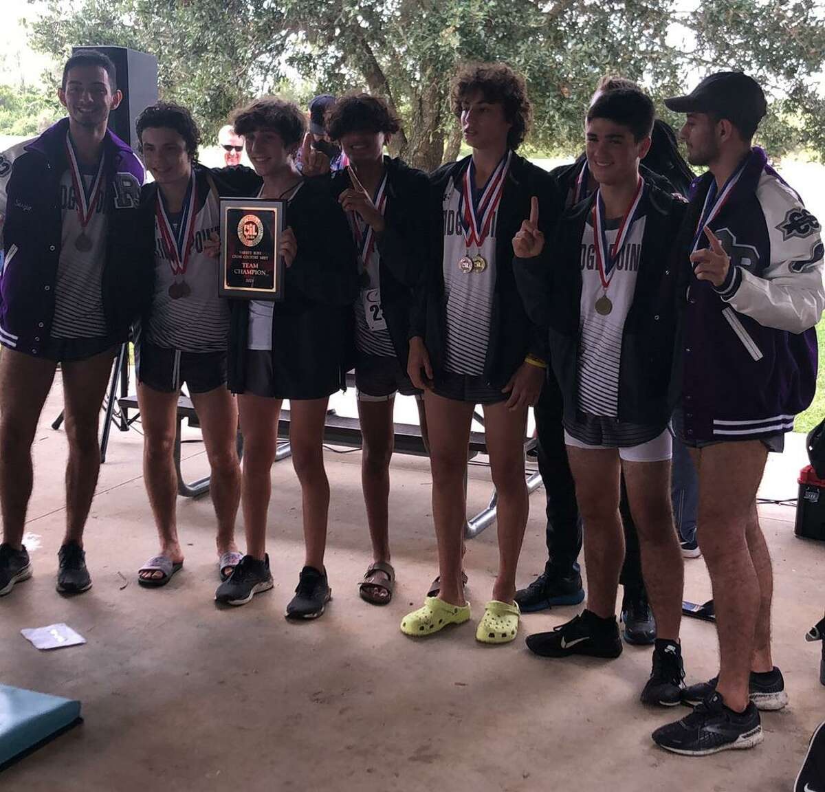 The Ridge Point boys cross country team of Andrew Blake, Charles Blake, Jesus Rojas, Sergio Rojas, Conner Kubycheck, Lukah Shah and Christian Devenish won the District 20-6A championship.
