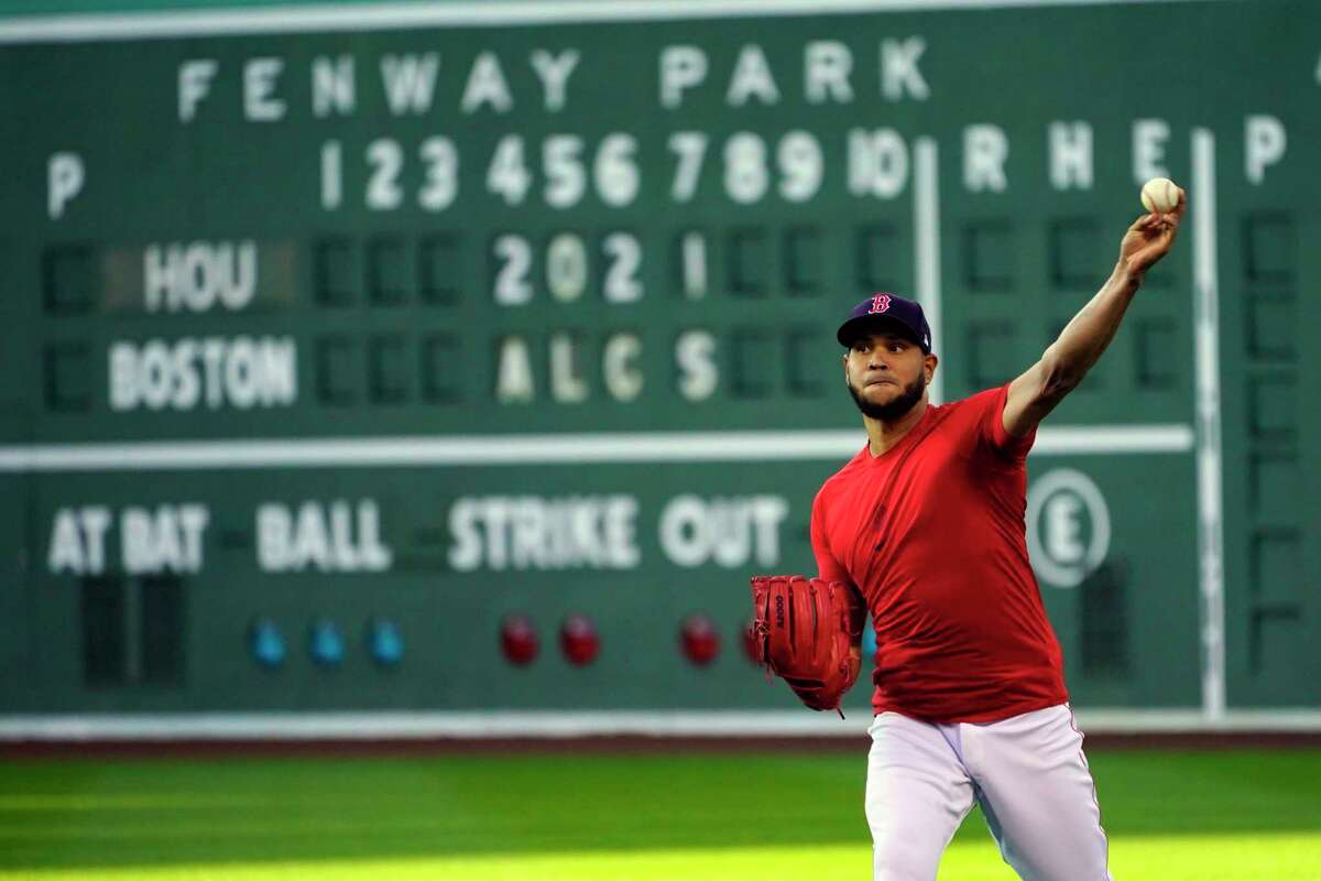 Boston Red Sox Game 3 starting pitcher Eduardo Rodríguez throws at a baseball practice at Fenway Park, Sunday, Oct. 17, 2021, in Boston. The Red Sox host the Houston Astros on Monday night. (AP Photo/Robert F. Bukaty)