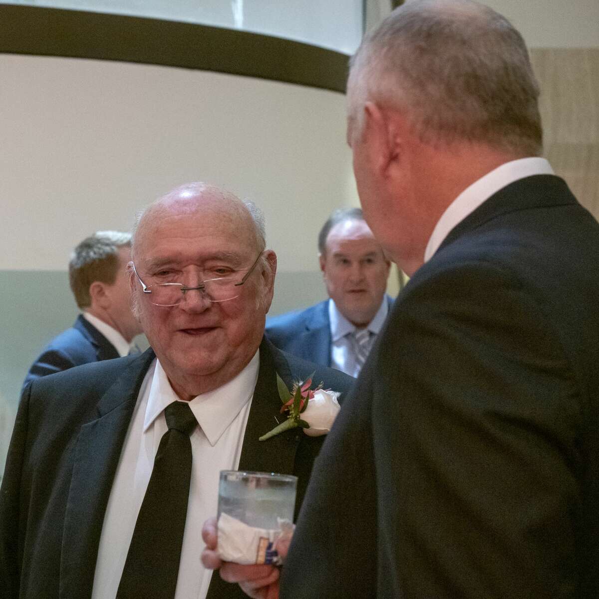 Friends and colleagues talk with and congratulate Dick Saulsbury Jan. 6, 2020 as he is honored by the Permian Basin Petroleum Association Top Hand Award at the Petroleum Club.