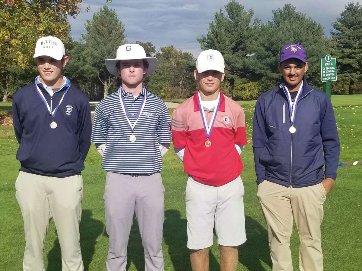 The top four golfers at the Division I state championship meet, from left to right, Alex Elia (Wilton), Connor Goode (Glastonbury), William Gregware (Conard) and Angad Manaise (Westhill). The meet was held at Chippanee Country Club in Bristol on Oct. 18, 2021.