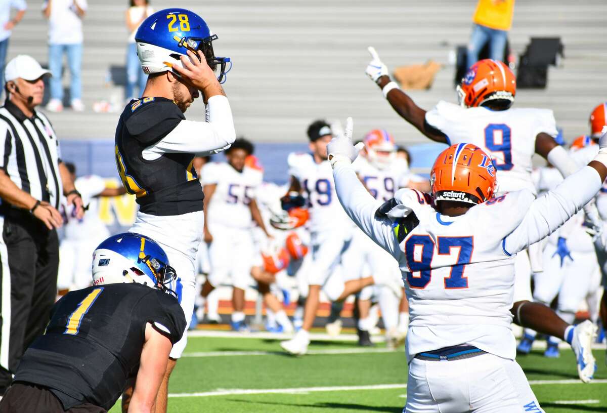 Louisiana College players celebrate after Jeffrey Lucido's 35-yard attempt at a game-tying field goal was missed in Wayland Baptist's 27-24 Sooner Athletic Conference loss on Saturday in Greg Sherwood Memorial Bulldog Stadium. 