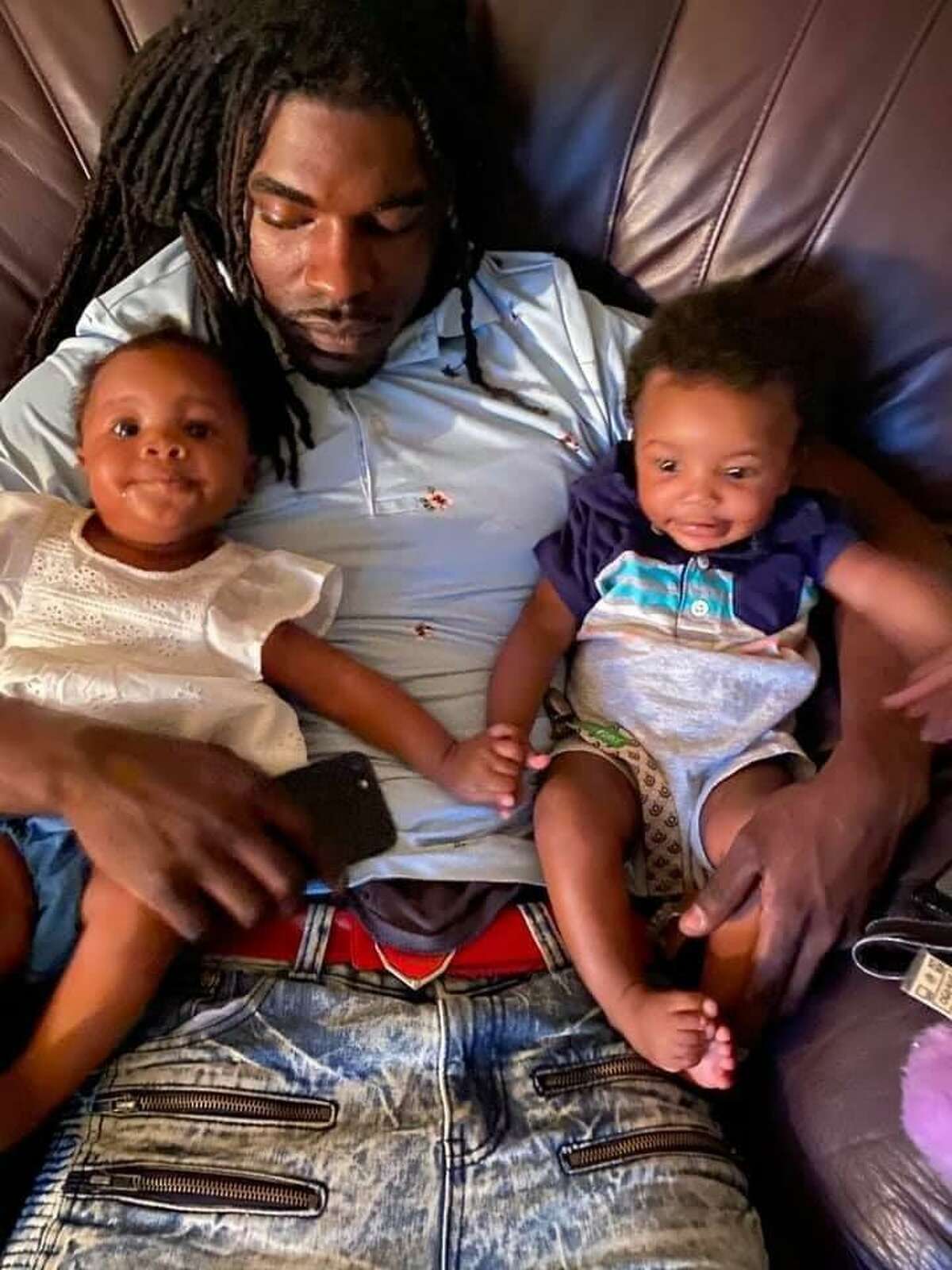 Melvin Stanley, with his children Mi’Ari and Ma’Kari.