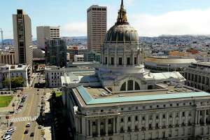S.F. public employees return to City Hall this week. Will it help the struggling neighborhood?