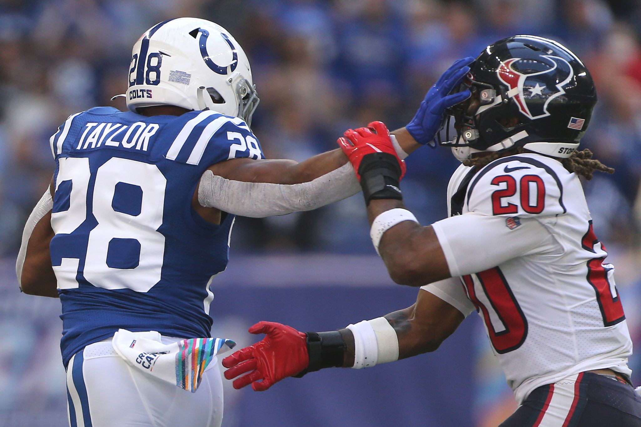 October 17, 2021: Indianapolis Colts wide receiver T.Y. Hilton (13) catches  the ball as Houston Texans safety Lonnie Johnson (1) defends during NFL  football game action between the Houston Texans and the